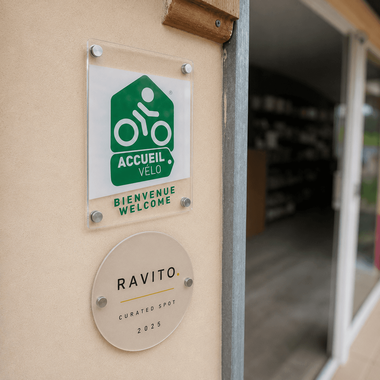 Ravito curated spot plaque at a partner venue